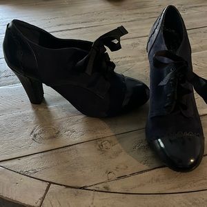 Details!! Ribbon laces, suede, and leather! Adorable navy booties.